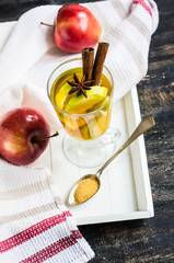 Apple cider with cinnamon sticks