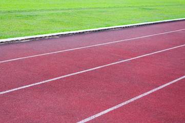 running track and green grass,Direct athletics Running track at Sport Stadium