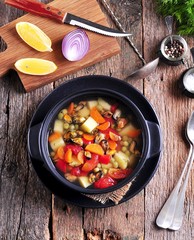 Fish soup with wild mussels, potatoes, carrots, tomatoes, pepper and dill.