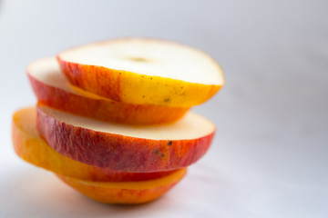 Obraz na płótnie Canvas Apple sliced for healthy food snack on white background