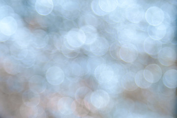 White bokeh background created by neon lights.