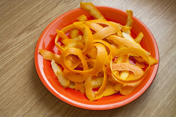 The skin of an orange on a plate