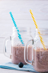 Blackberry smoothie in the glass jars