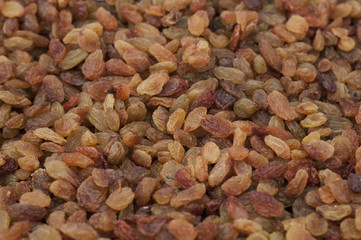 Dried grapes, raisins in market, texture background