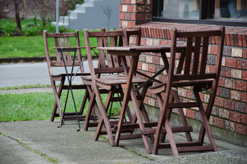 Fototapeta na wymiar Tables and chairs outside a cafe