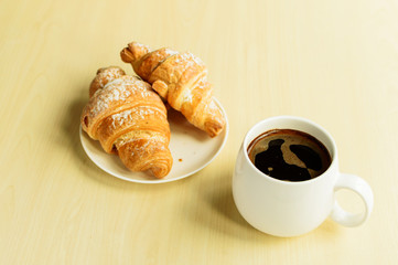 Working time, coffee break with some croissants