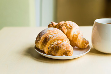 Working time, coffee break with some croissants