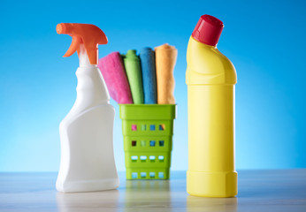 Variety of cleaning products,home work, on blue background