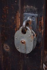 Vintage padlock on old door