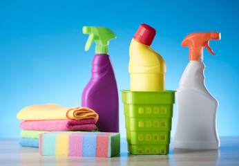 Variety of cleaning products,home work, on blue background