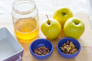 Baked apple with honey and pistachio nuts