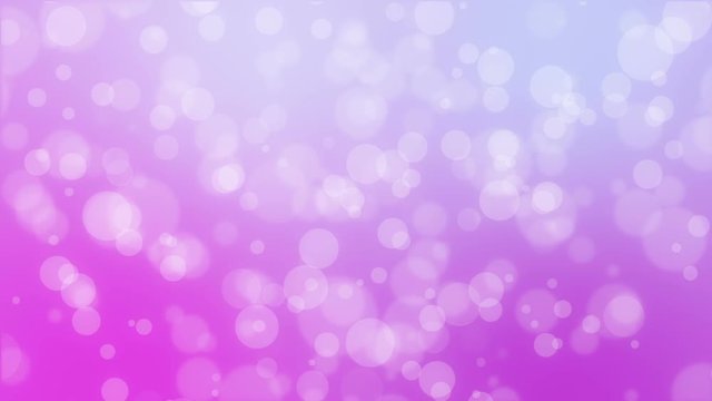 Bokeh holiday background with floating particles against a purple pink backdrop