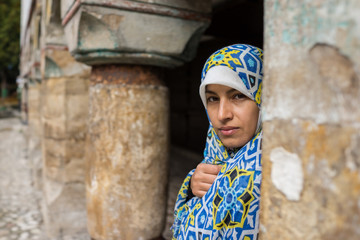 Muslim traditional woman visiting old historical city © Jasmin Merdan