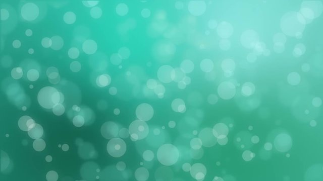 Bokeh holiday background with floating particles against a green gradient backdrop