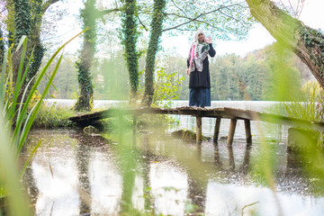 Muslim Arabic young beautiful woman in nature