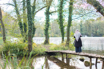 Muslim Arabic young beautiful woman in nature