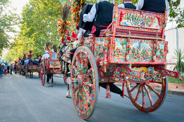 A typical colored sicilian cart during a folkloristic show - obrazy, fototapety, plakaty