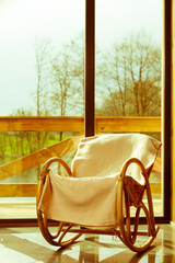 Comfortable armchair with window in background