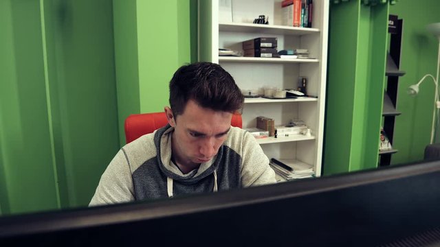 the Service Desk Working at a Computer