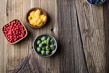 Assorted natural medical herbs and mortar