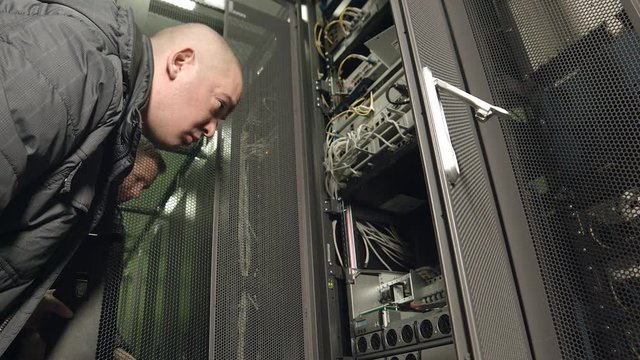 Staff of the Data Center Server Rack Inspect