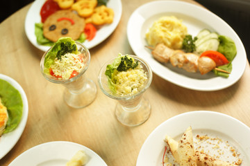 a wide selection of delicious meals on the table in the restaura