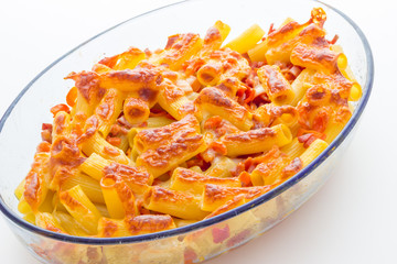 Baked macaroni cheese with tomatoes and sausage
