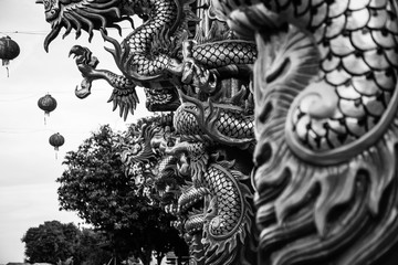 Fototapeta premium Dargon statue on Shrine roof no White background and black ,dragon statue on china temple roof as asian art