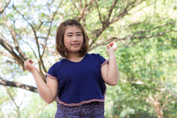 Beautiful young asia woman with tree