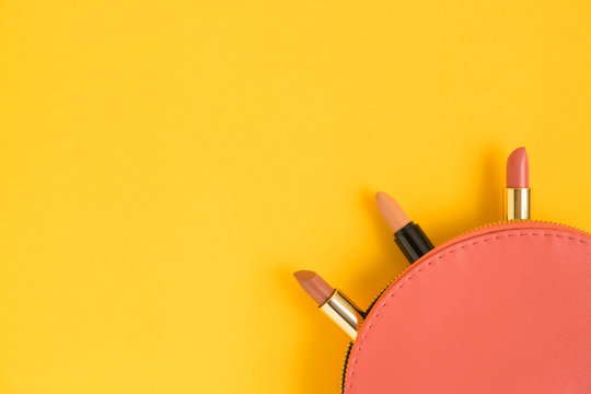 Top View Of Cosmetic Bag With Lipsticks