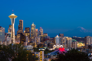 Seattle skyline and Mt Ranier at twilight