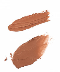 Brown color lipstick stroke on white background