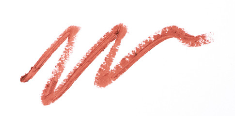 Red colour lipstick stroke on white background