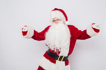 Fototapeta na wymiar Happy Christmas Santa Claus Dancing. Isolated on white background