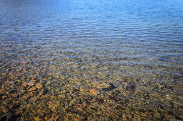 background blue sea yellow stones