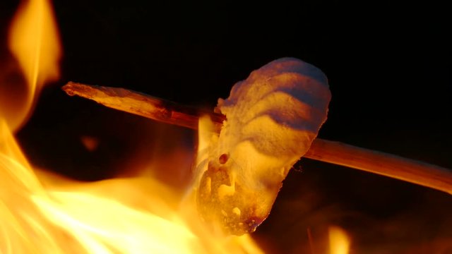 4K . Marshmallows At Camp Fire, bonfire. Macro view