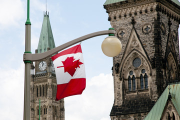 Fototapeta na wymiar Canadian Flag on Parliament Hill - Ottawa - Canada