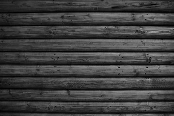 A black and dark wood texture background