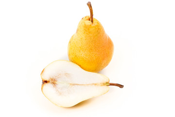 Whole pear and cut pear isolated on white