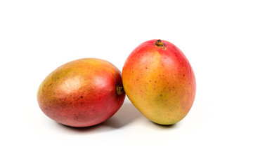 Two ripe mangos isolated on white background