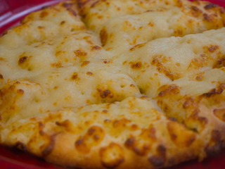 Single serving cheese pizza.