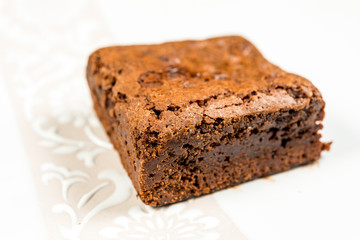 Chocolate Brownie cake on a dark plate