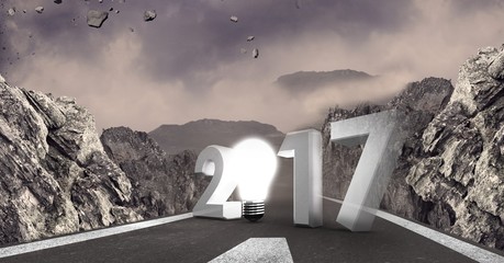 Composite image of 2017 with light bulb against a road
