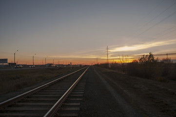 Railroad in the summer evening. Sundown. North