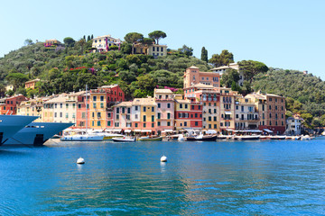 Fototapeta na wymiar Portofino port with colorful houses, boats and Mediterranean Sea, Italy