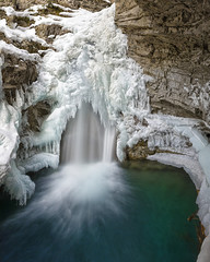Fototapeta premium Johnston Canyon Falls in Banff National Park Alberta Canada in winter
