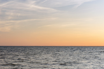 Calm pastel sunset over ocean