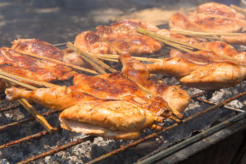 Grilled chicken on rural market