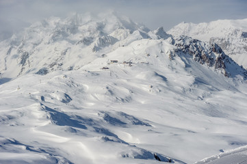 Obraz premium Alpine winter mountain landscape. French Alps with snow.