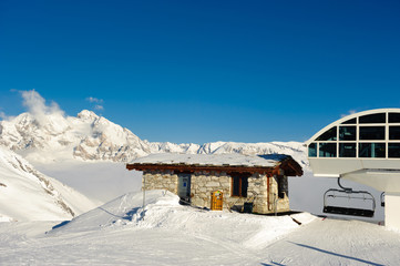 Ski lift in mountains at winter